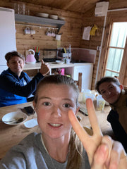 three people in a kitchen
