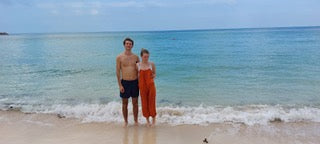 two people by the sea