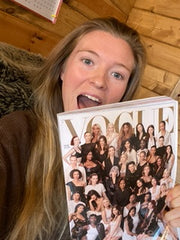 person holding a magazine